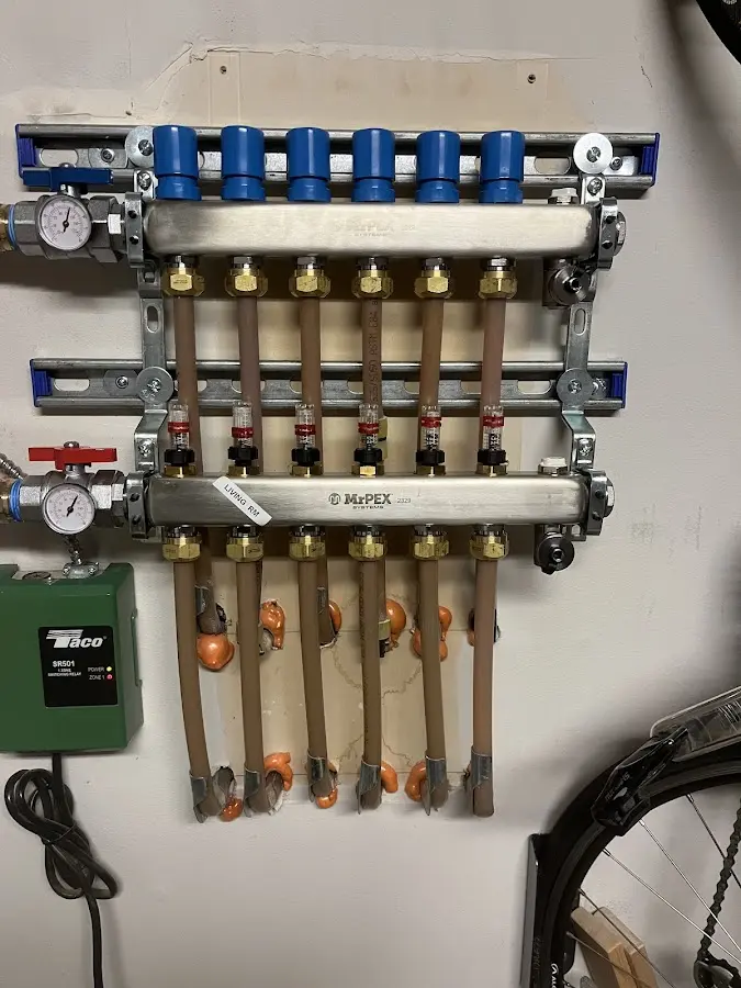 Plumber performing Gas Leak Detection at a residential property in Rochester